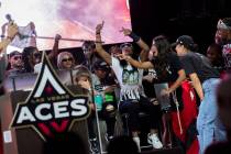 The Las Vegas Aces celebrate their WNBA basketball championship win during a parade down Las Ve ...