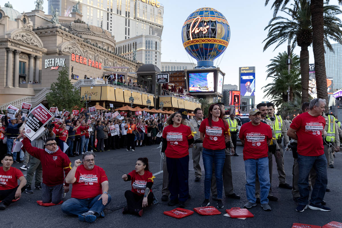 Culinary Local 226 members are arrested as they block traffic during a rally along Las Vegas Bo ...