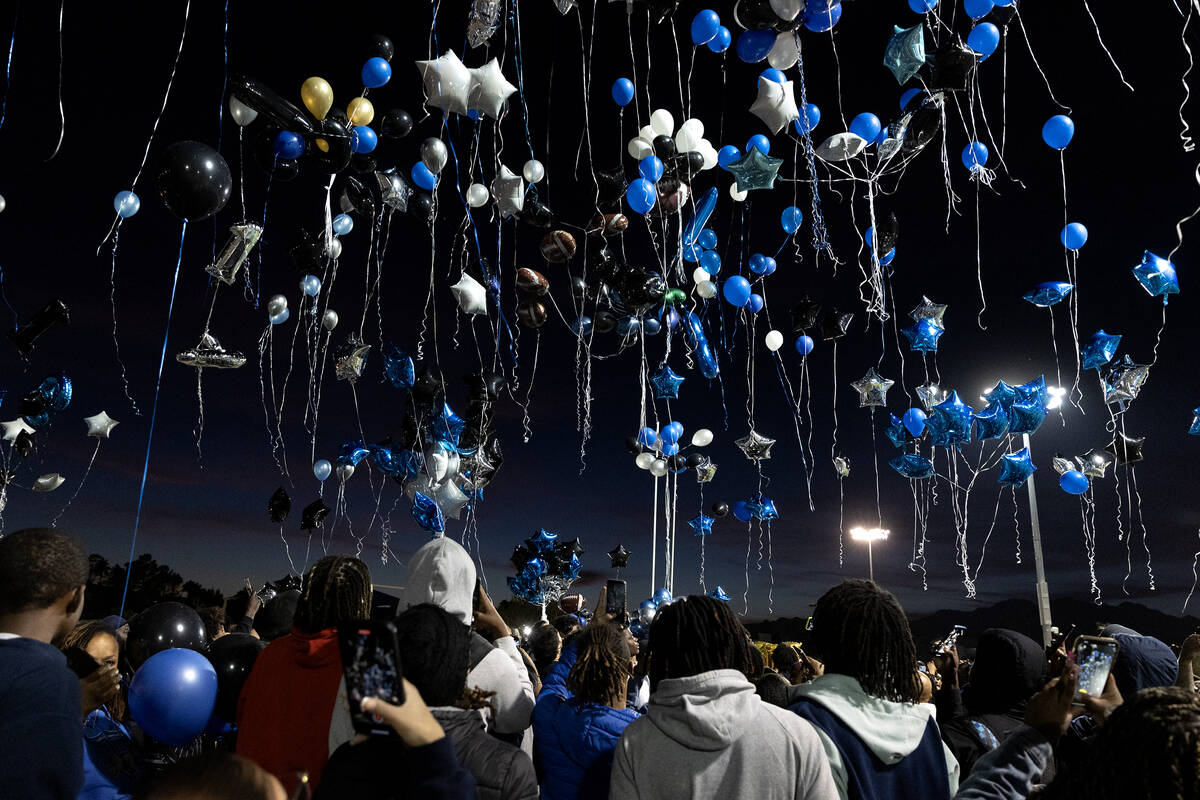 Balloons are release in honor of Desert Pines High School football player, Se’Mauri Norr ...