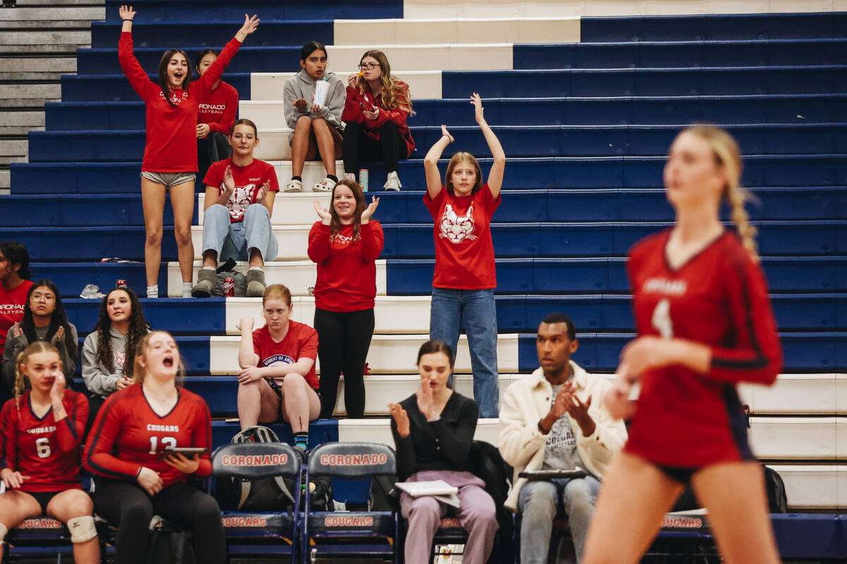 Coronado fans celebrate their team scoring a point during a Class 5A Southern Region volleyball ...