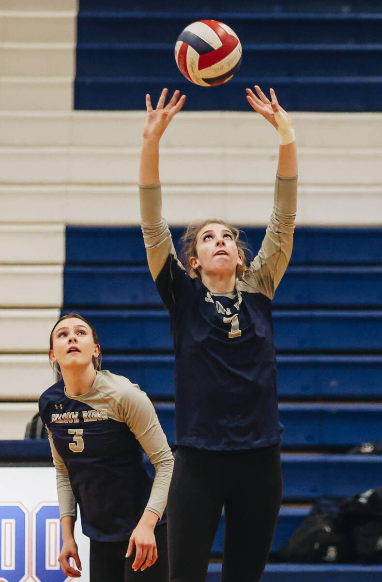 Shadow Ridge setter Madi Miller (7) reaches the ball during a Class 5A Southern Region volleyba ...