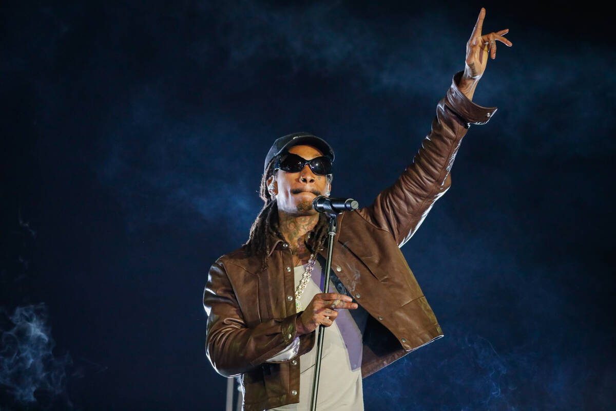 Wiz Khalifa looks to the crowd during a performance at the 2023 SEMA Fest on Friday, Nov. 3, 20 ...