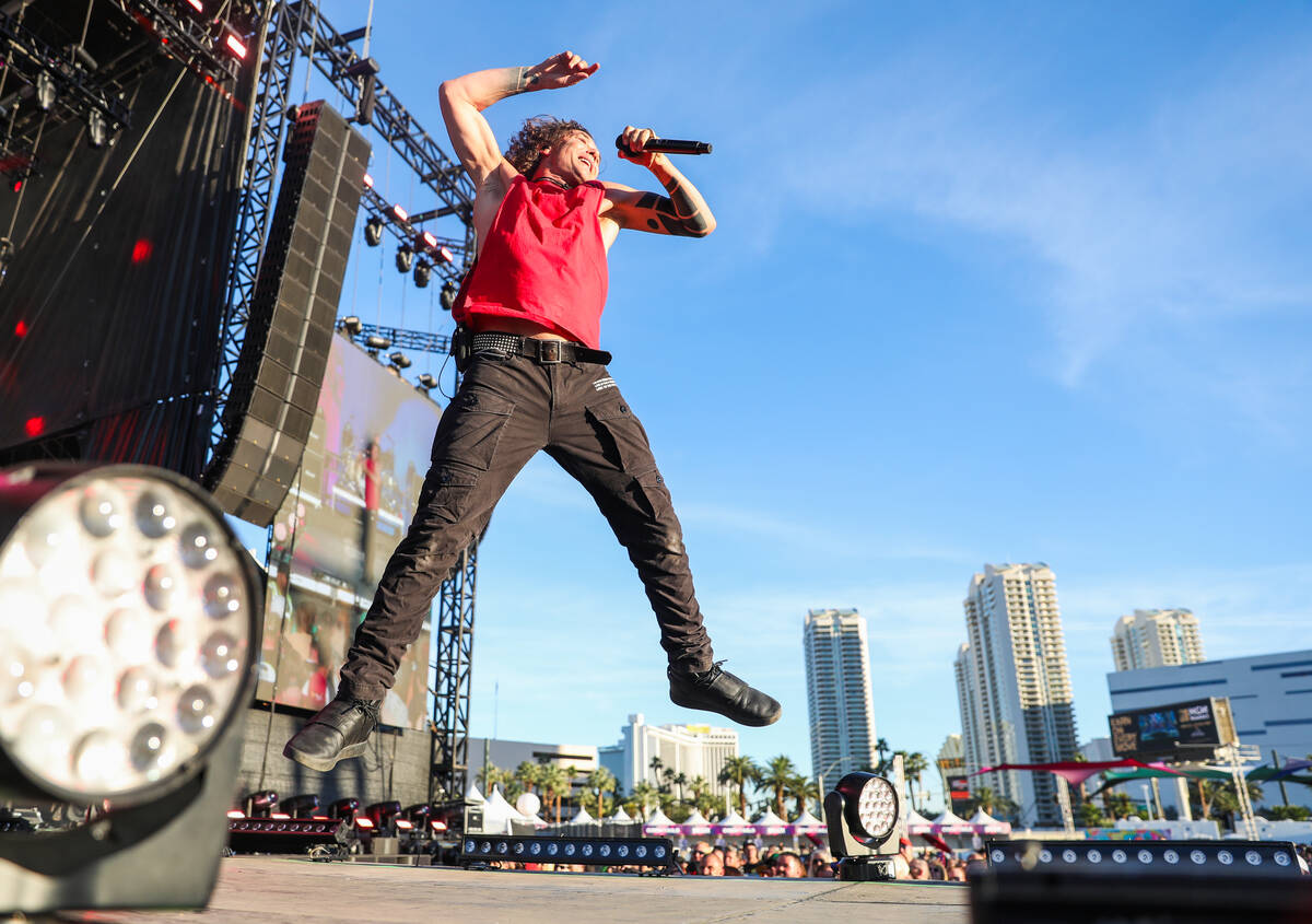 Gavin Rossdale, lead singer of Bush, jumps in the air during a performance at the 2023 SEMA Fes ...