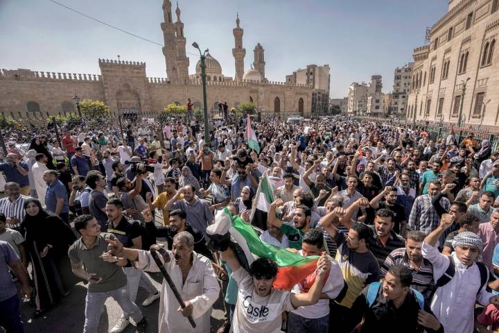 FILE - Protesters shout anti-Israel slogans during a rally to show solidarity with the people o ...