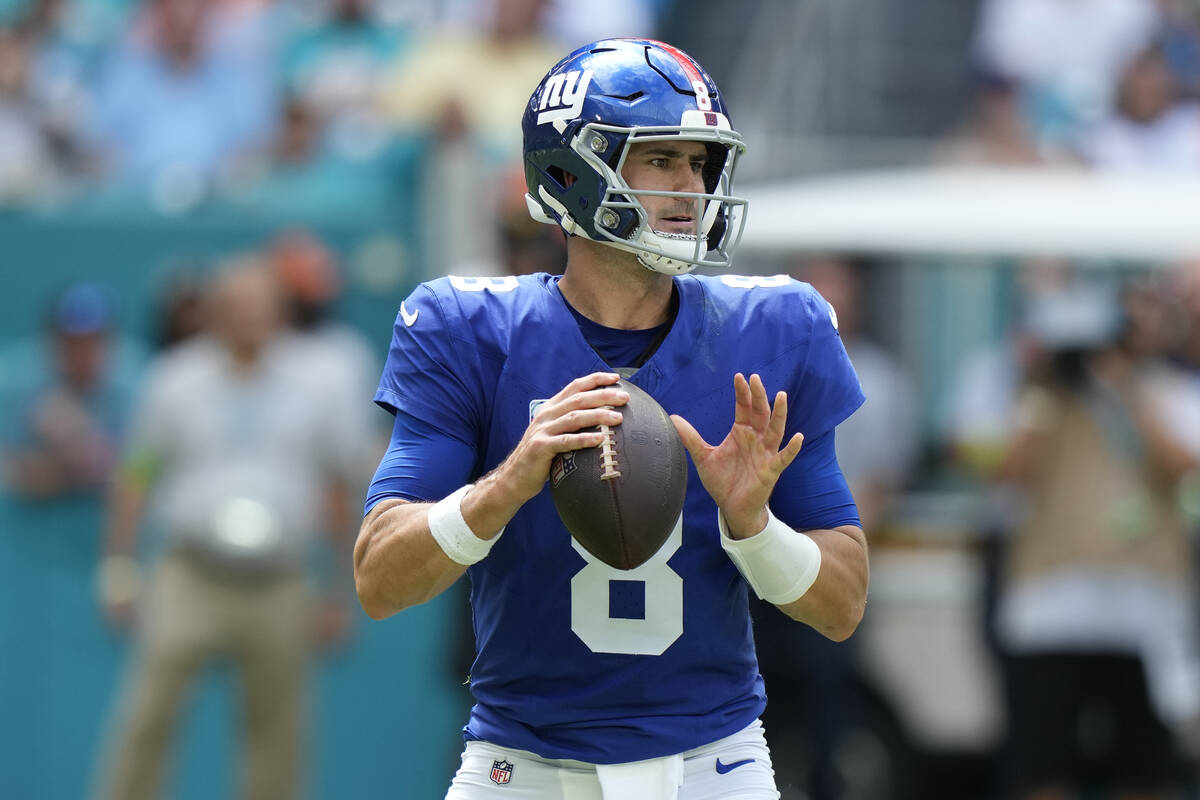 New York Giants quarterback Daniel Jones (8) looks to pass during an NFL football game against ...