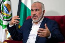 Ghazi Hamad, a member of Hamas' decision-making political bureau, speaks during an interview wi ...