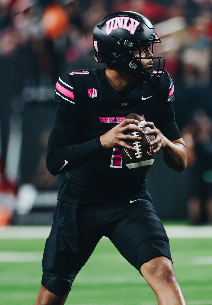 UNLV quarterback Jayden Maiava (1) looks to throw the ball to a teammate during a game against ...