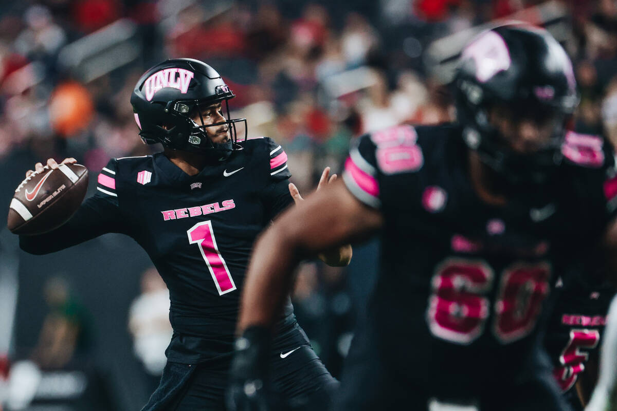 UNLV quarterback Jayden Maiava (1) looks to throw the ball to a teammate during a game against ...