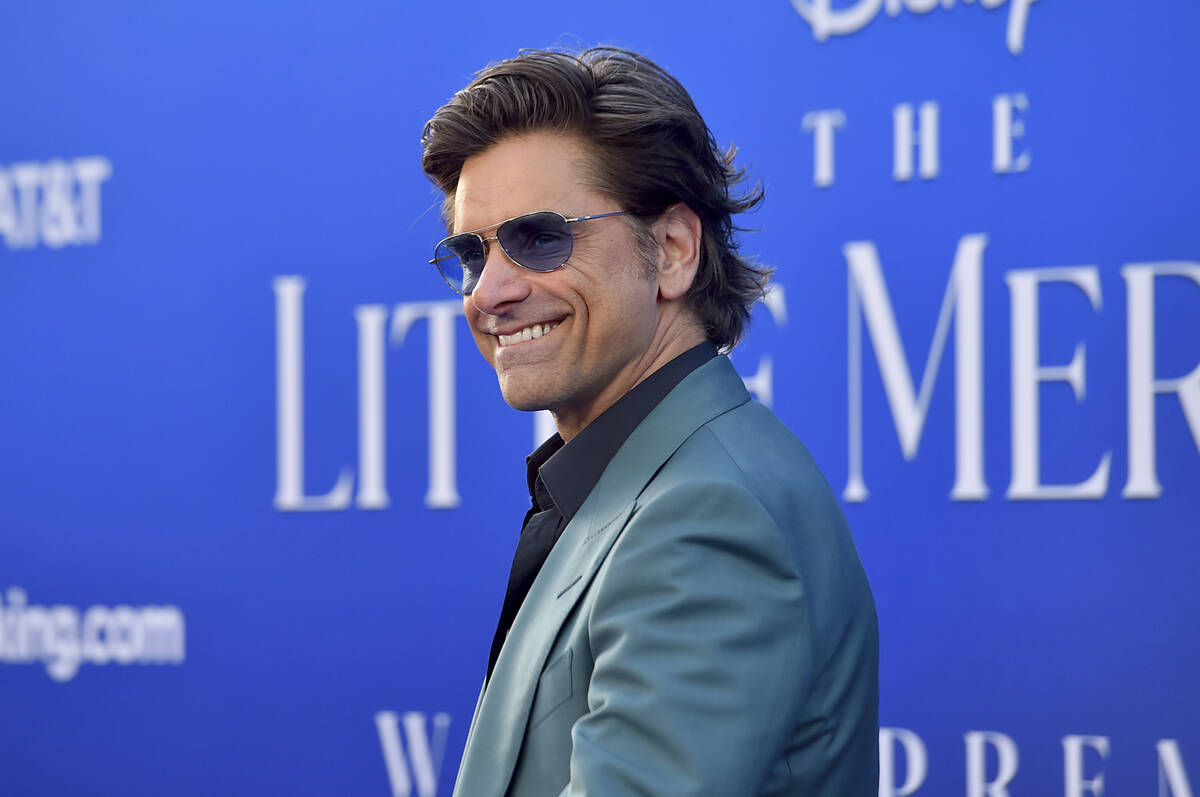 John Stamos arrives at the world premiere of "The Little Mermaid" on Monday, May 8, 2 ...