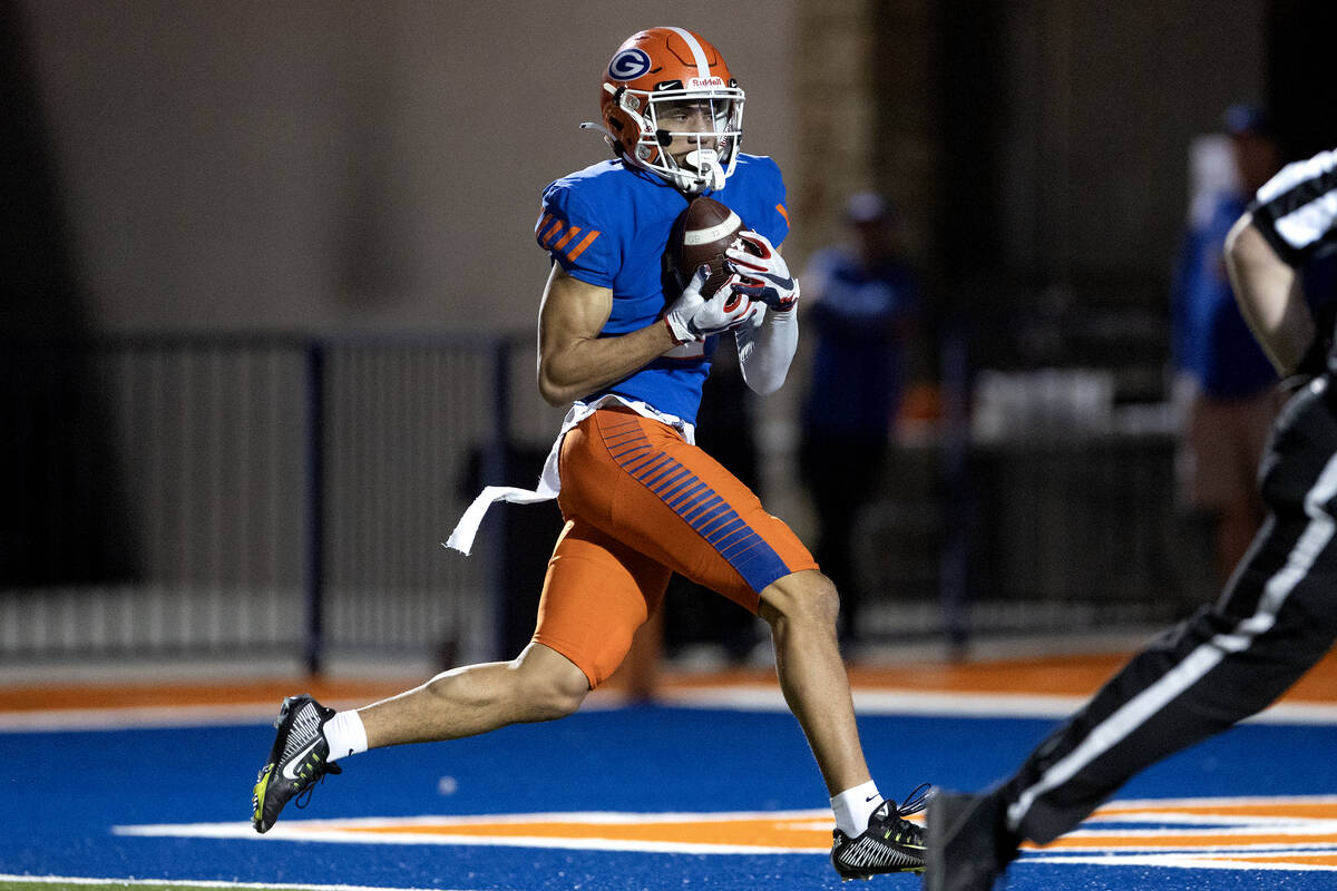 Bishop Gorman running back Devon Rice (3) catches a touchdown pass during the first half of a C ...