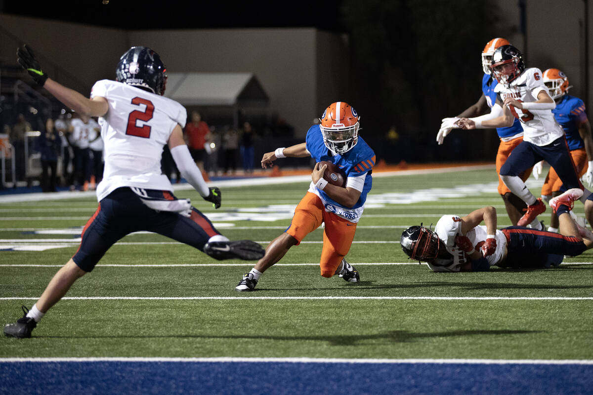 Bishop Gorman running back Myles Norman (24) carries the ball toward the end zone while Coronad ...