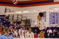 Bishop Gorman’s Ayanna Watson (4) spikes the ball during a volleyball game between Footh ...