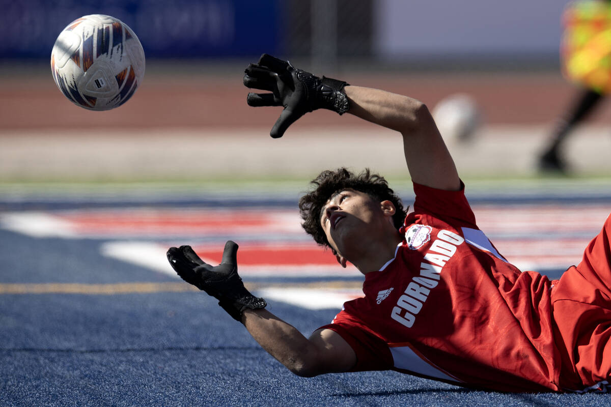Coronado goalkeeper Logan Pierce misses the save on a Palo Verde goal during the first half of ...