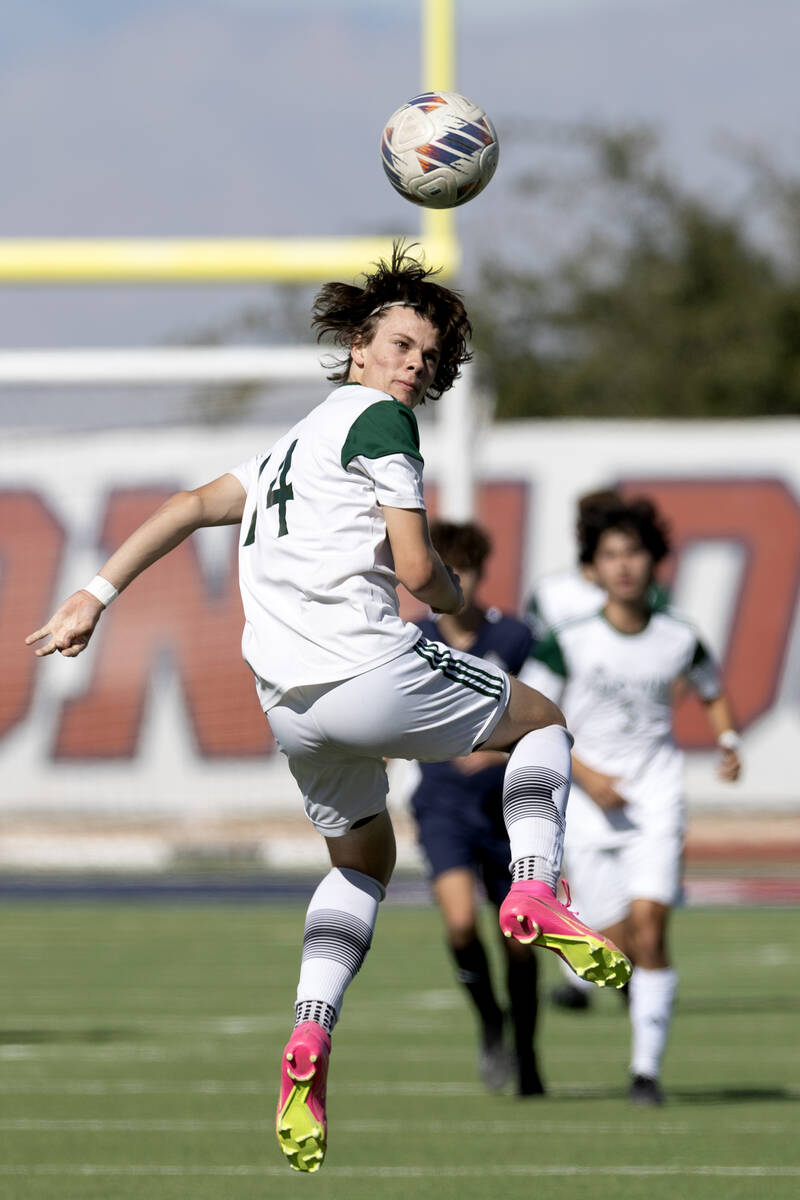 Palo Verde forward Evan Odle (14) heads the ball during the first half of a Class 5A Southern R ...