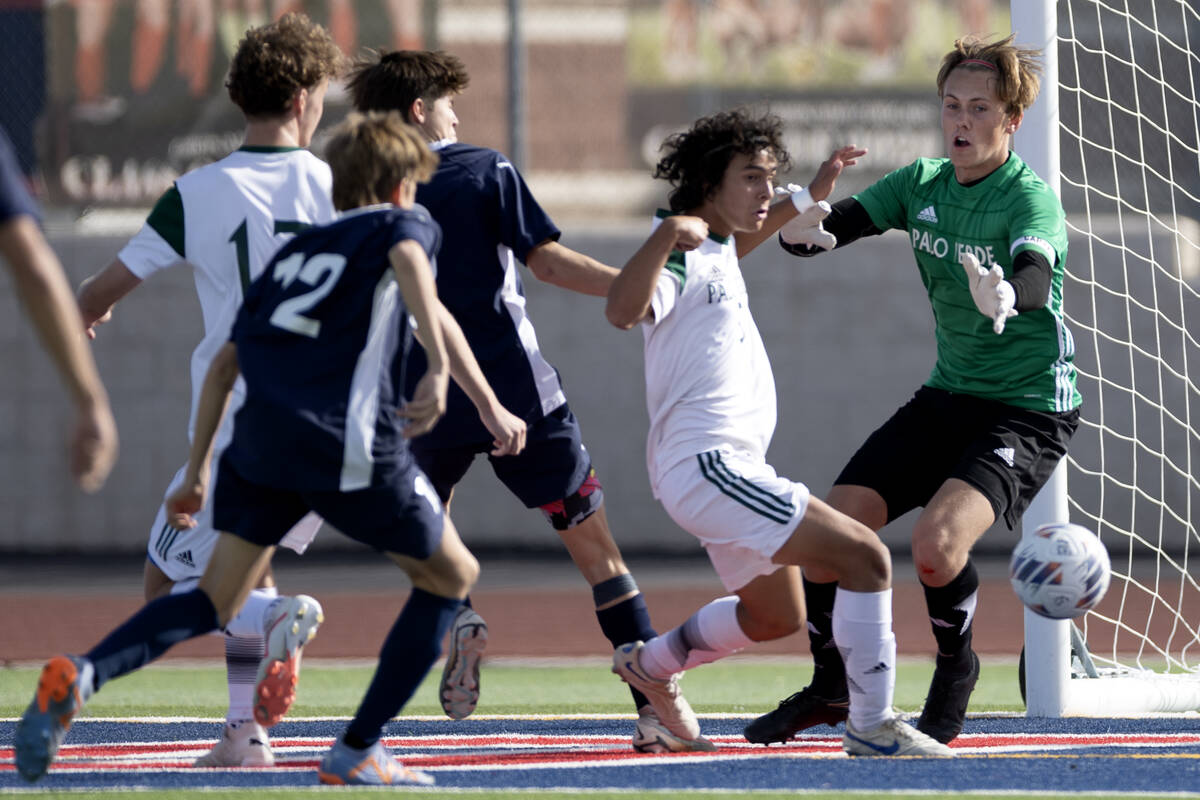 Palo Verde goalkeeper Henri Kettner, right, saves Coronado’s shot on goal during the sec ...