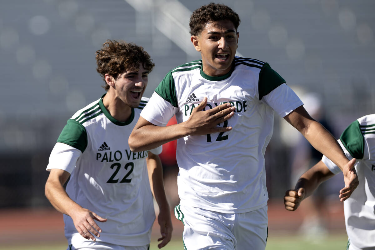 Palo Verde’s Vincent Velazques (22) and Robert Sarkisian (12) celebrate a goal during th ...