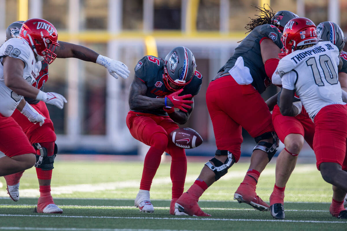 New Mexico's Jacory Croskey-Merritt fumbles the ball during the second quarter of the team's NC ...