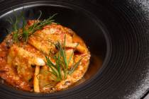 Crab culurgiones — crab-stuffed dumplings in a lobster absinthe pomodoro — are on the seven ...