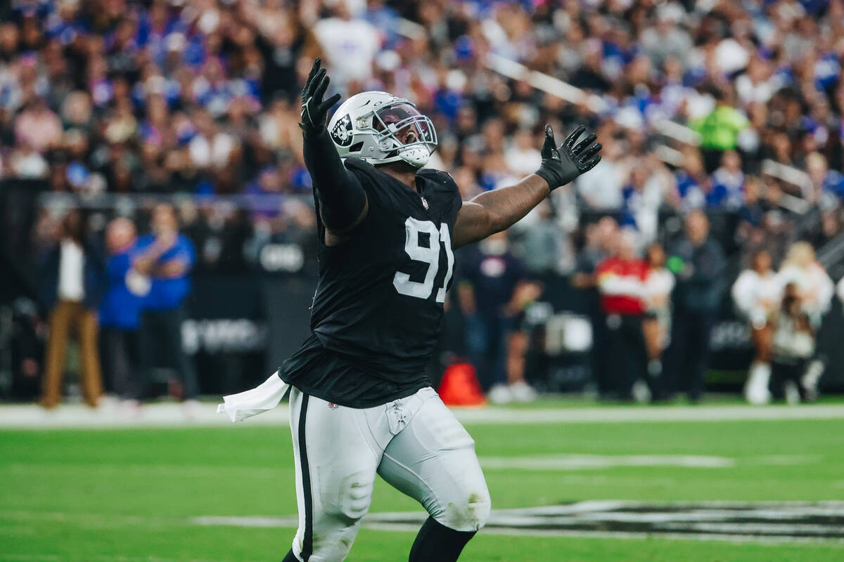 Raiders defensive tackle Bilal Nichols (91) celebrates a turn over during the first half of a g ...