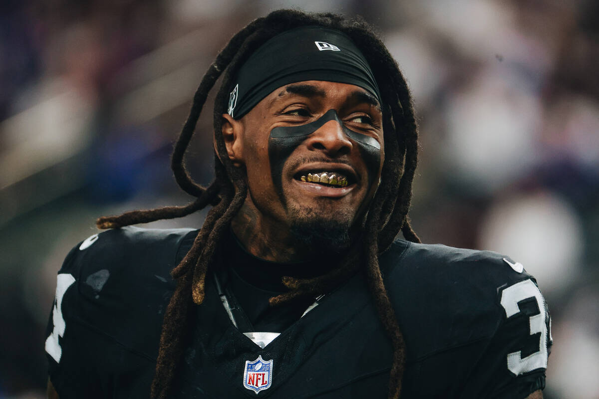 Raiders running back Brandon Bolden (34) gets amped up before a game against the New York Giant ...