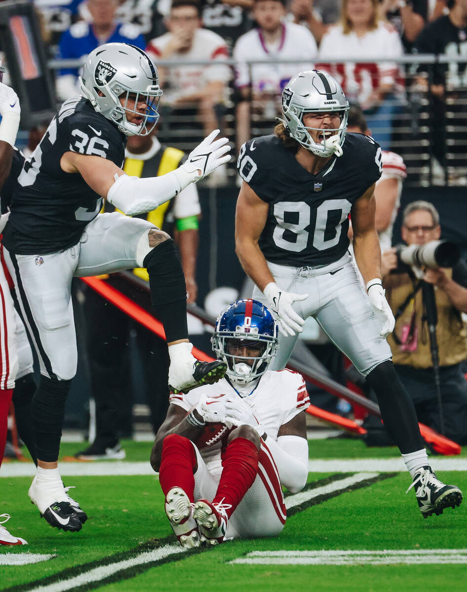 Raiders tight end Jesper Horsted (80) celebrates a tackle on New York Giants wide receiver Parr ...