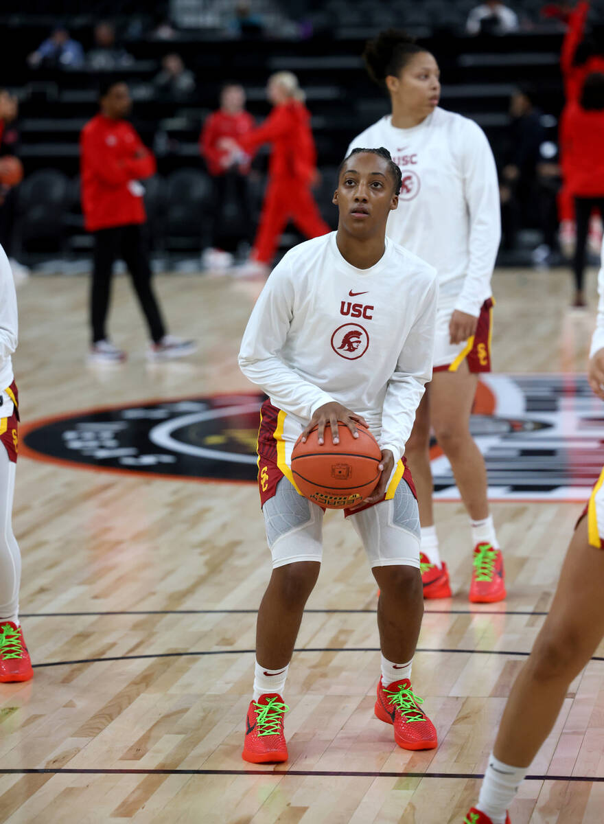 Spring Valley High basketball star Aaliyah Gayles, center, warms up with her USC teammates befo ...