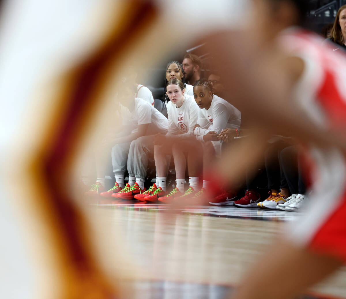 Former Spring Valley High basketball star Aaliyah Gayles, right, watches with her USC teammates ...