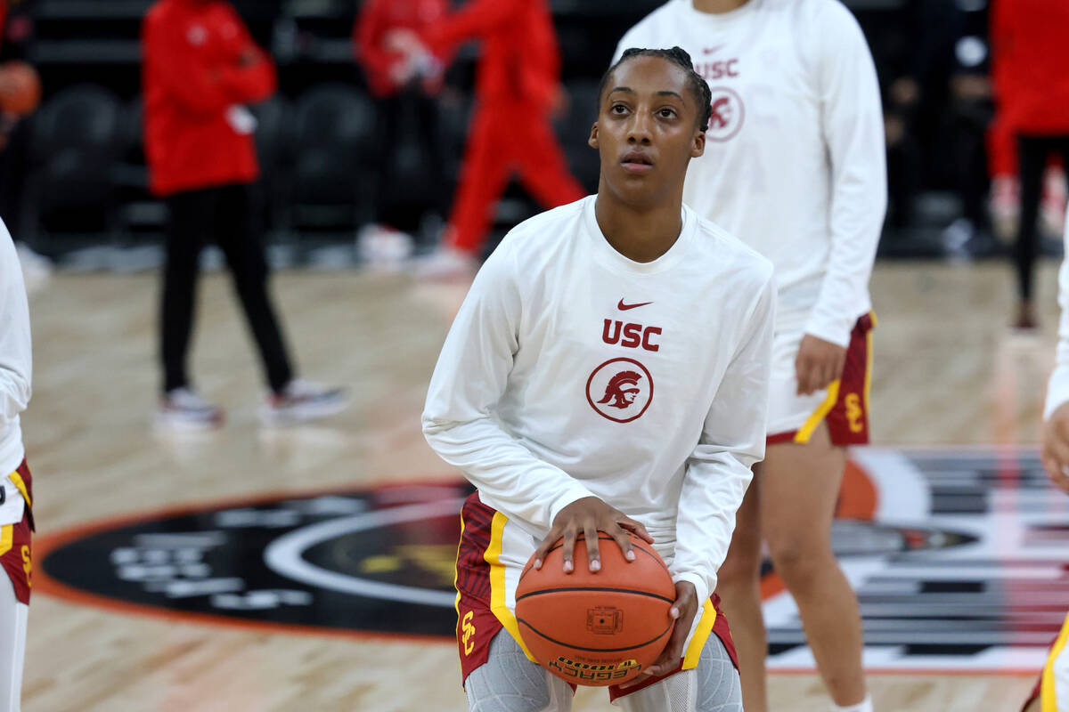 Spring Valley High basketball star Aaliyah Gayles, center, warms up with her USC teammates befo ...