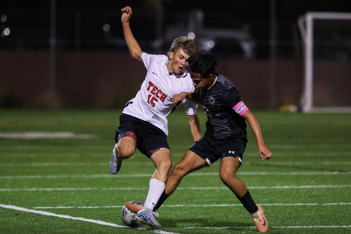 Southeast Career Technical Academy’s Jace Pressgrove (15) and Faith Lutheran’s Dm ...