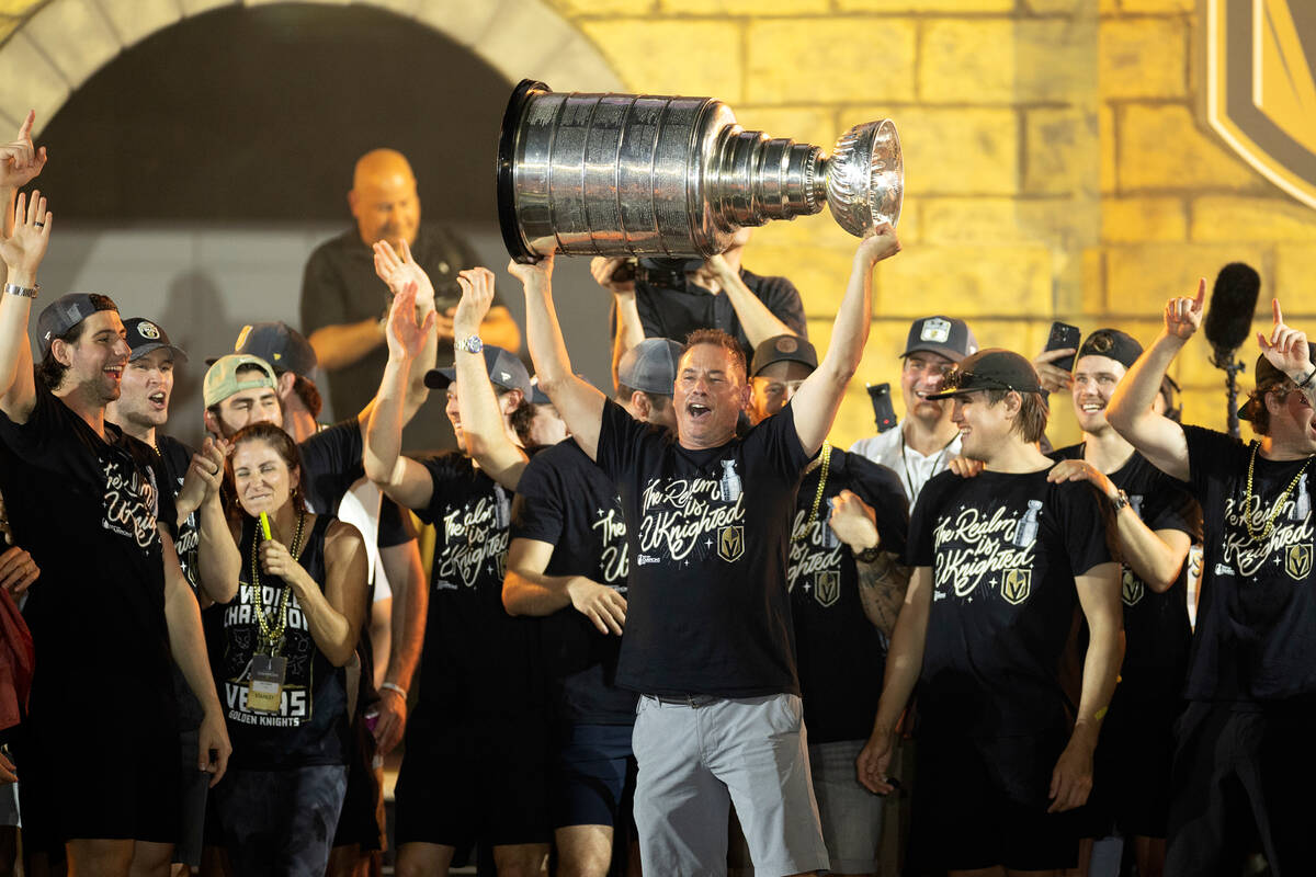 Golden Knights head coach Bruce Cassidy celebrates with the Stanley Cup during Golden Knights S ...