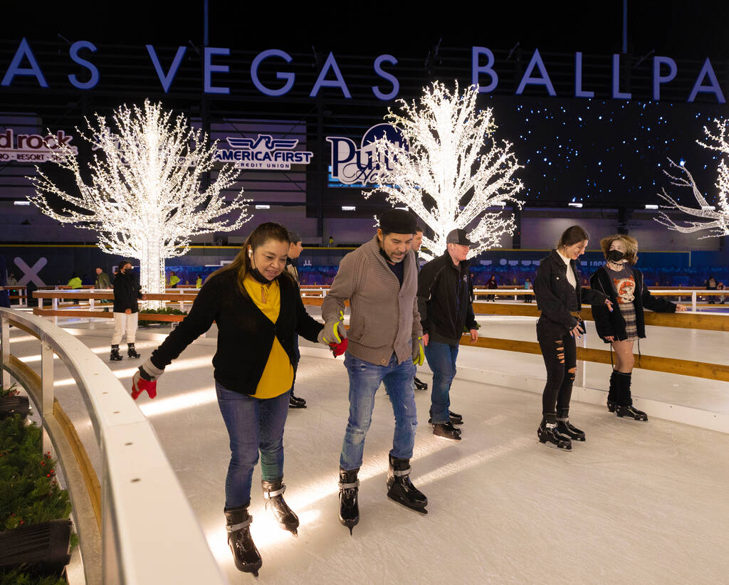 Ice skaters enjoy Enchant Christmas at Las Vegas Ballpark in 2021, in Las Vegas. (Benjamin Hage ...
