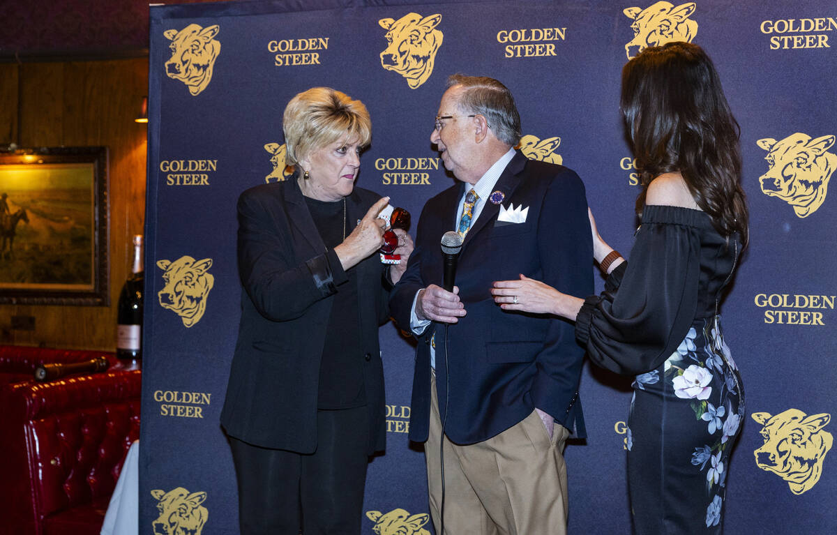 Las Vegas Mayor Carolyn Goodman talks with owner Dr. Michael Signorelli joined by his daughter ...