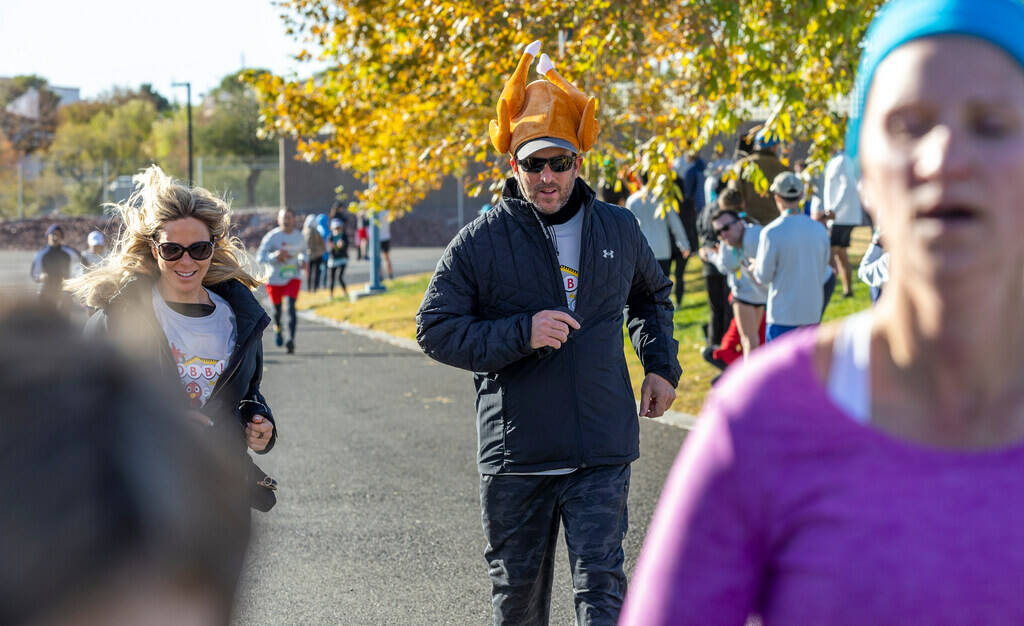 Runners cruise to the finish line during the Wobble Before You Gobble 5K run at Kellogg Zaher P ...