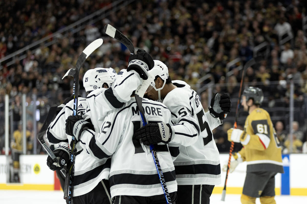 The Kings celebrate a goal during the second period of an NHL hockey game against the Golden Kn ...