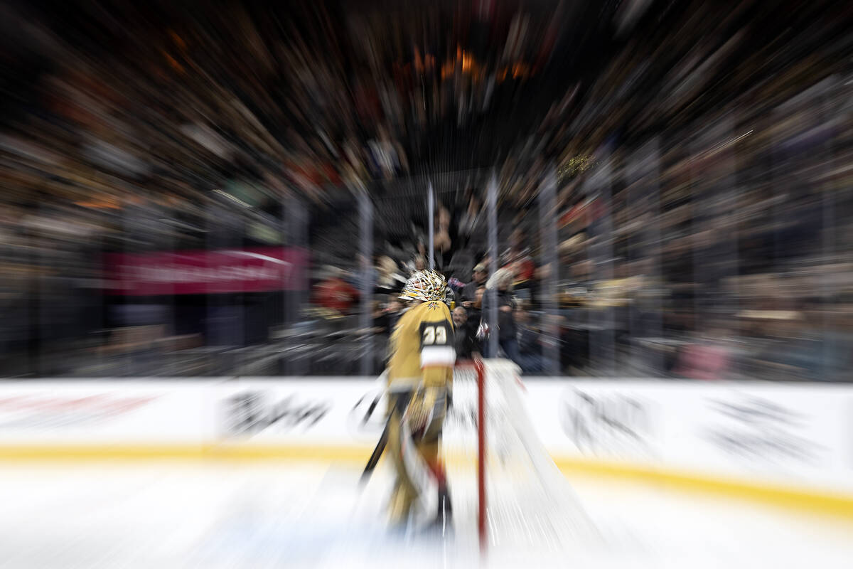 Golden Knights goaltender Adin Hill (33) mans the net during the second period of an NHL hockey ...