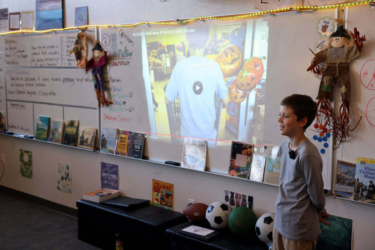 Zachary Austin, a fifth grade student at Ortwein Elementary in Las Vegas, presents his monthly ...