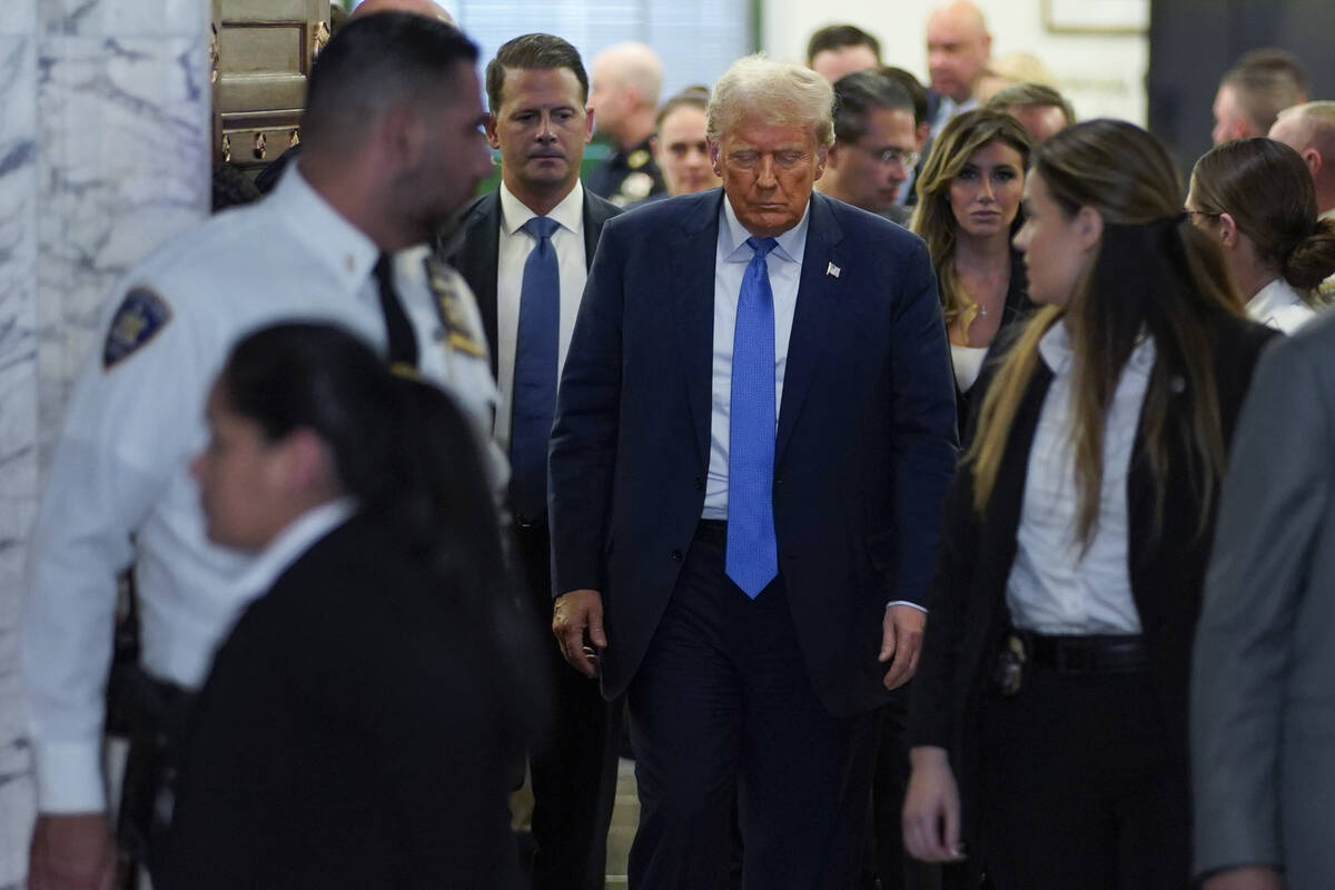 Former President Donald Trump walks out of the courtroom after testifying at New York Supreme C ...