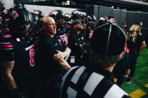 UNLV head coach Barry Odom waits to lead his team onto the field before a game against Colorado ...