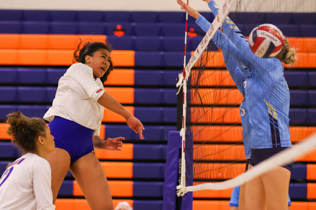 Bishop Gorman’s Leilia Toailoa (18) spikes the ball during a volleyball game between Foo ...