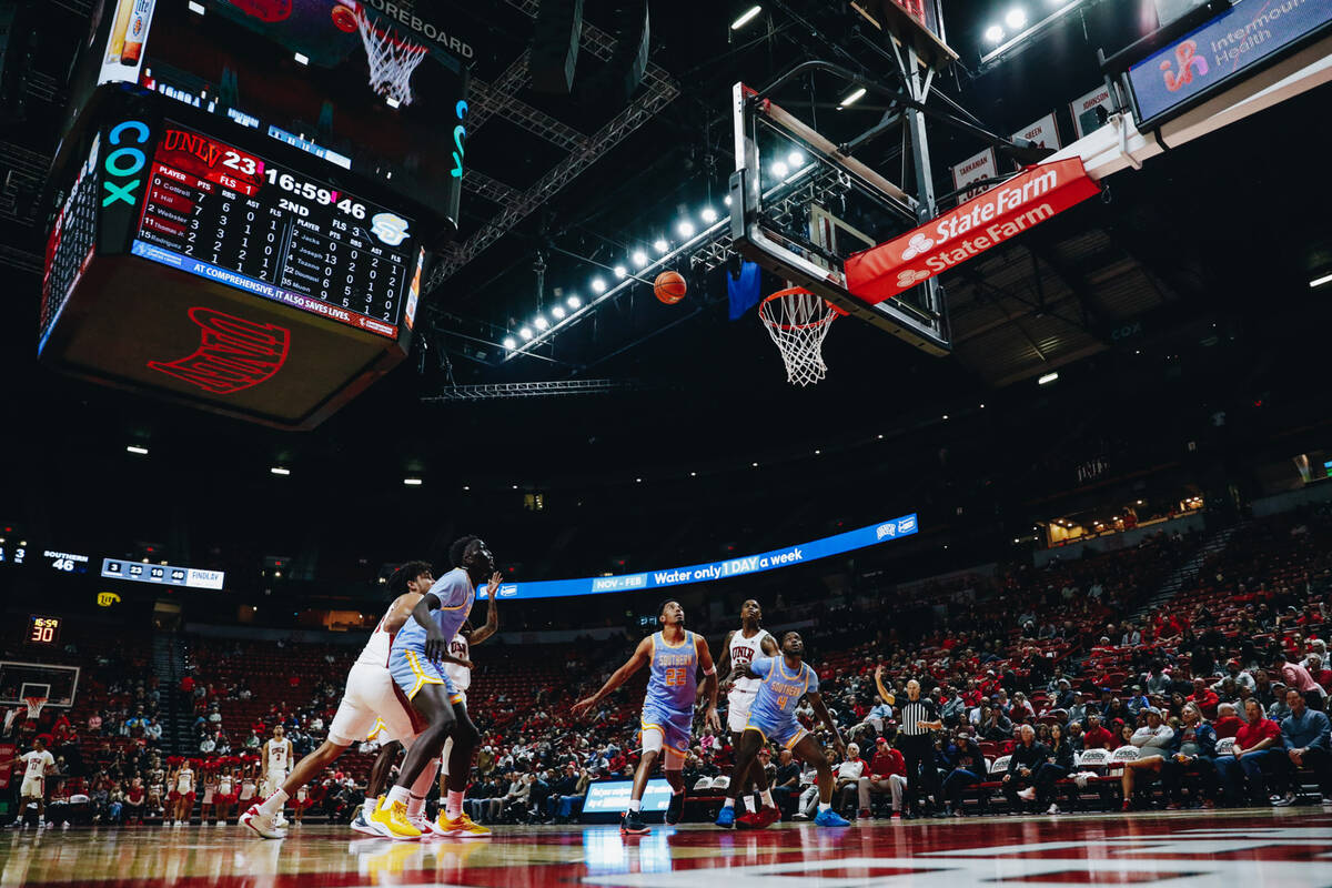 Southern players go in for the ball after a UNLV free throw during a game at Thomas & Mack ...