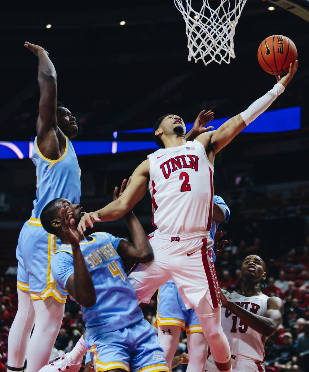 UNLV guard Justin Webster (2) goes for a layup during a game against Southern at Thomas & M ...