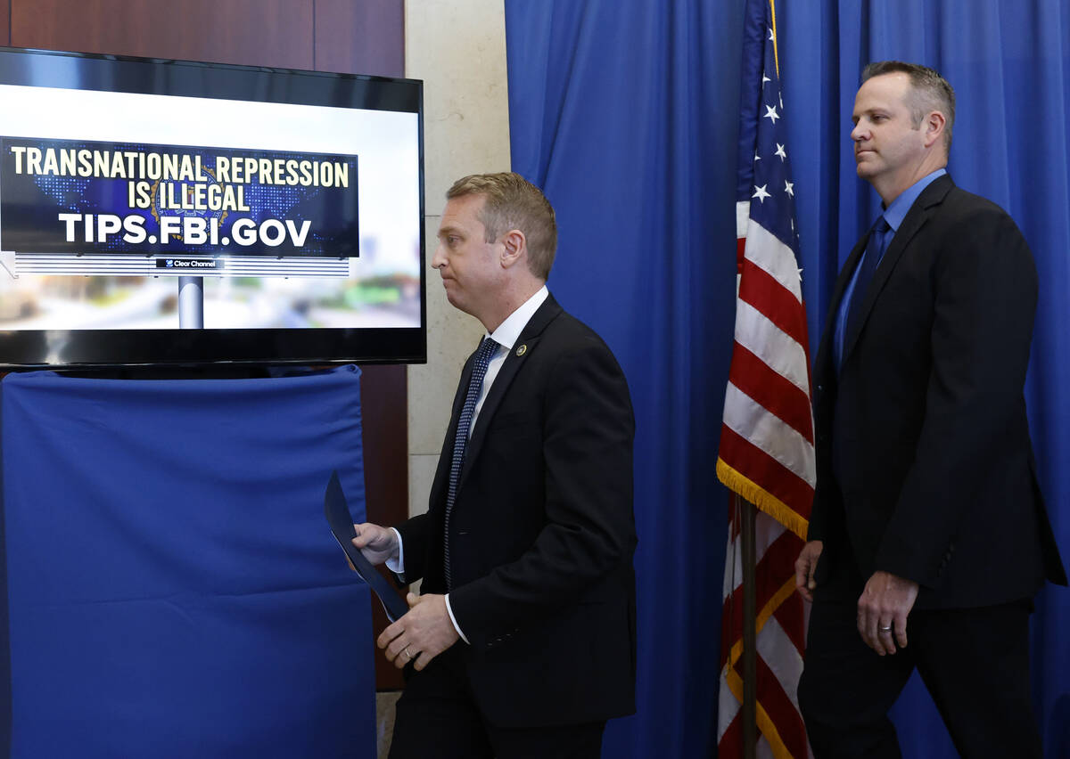 Spencer Evans, left, special agent in charge of the Las Vegas Federal Bureau of Investigation o ...