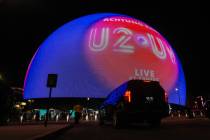 Excited fans wait outside of the Sphere on the night of its inaugural performance featuring U2 ...