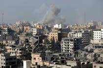 Smoke rises following Israeli airstrikes on Gaza City, Thursday, Nov. 9, 2023. (AP Photo/Abed K ...