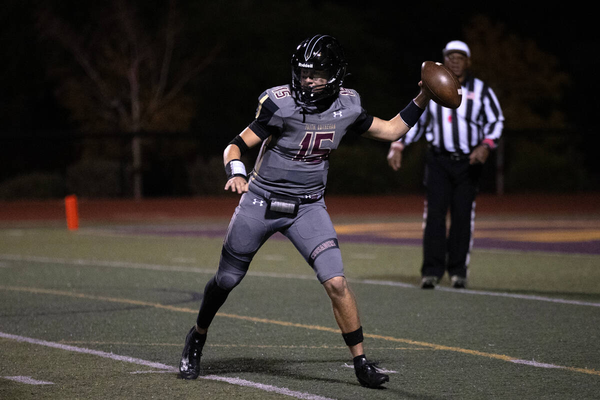 Faith Lutheran quarterback Alex Rogers (15) moves to pass during the second half of a high scho ...