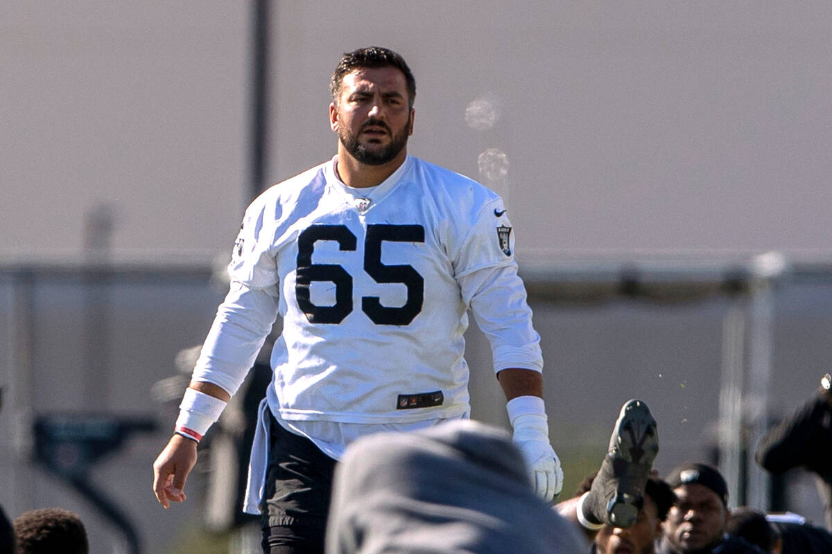 Raiders center Hroniss Grasu (65) stretches during practice at the Intermountain Health Perform ...