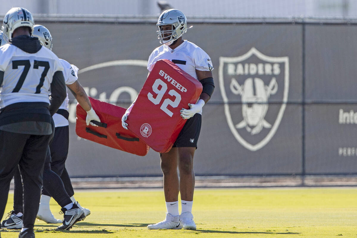 Raiders offensive tackle Brandon Parker (75) prepares to drill during practice at the Intermoun ...