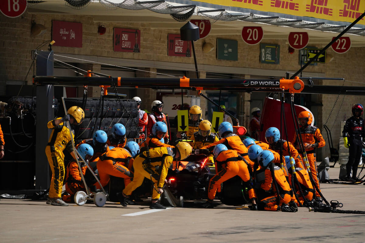 McLaren driver Lando Norris, of Britain, makes a pit stop during the F1 U.S. Grand Prix auto ra ...