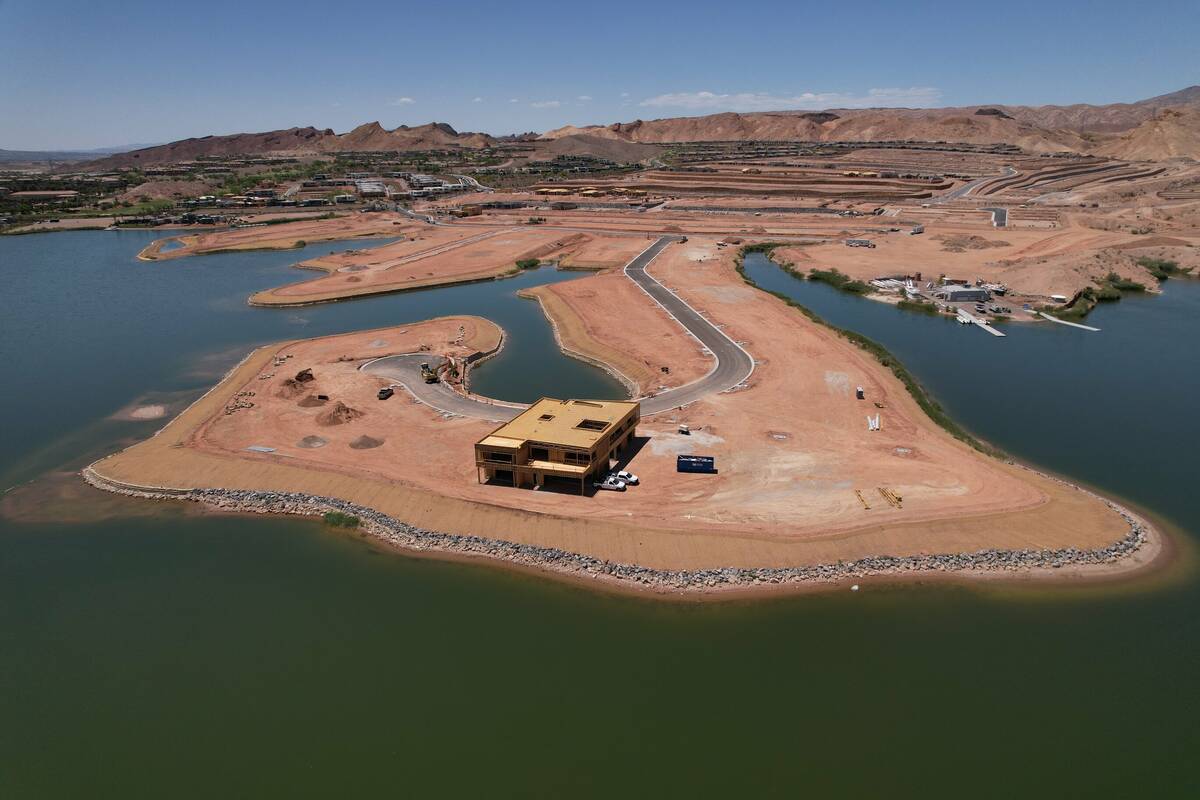 A two-story residence is being constructed on a tiny peninsula at Lake Las Vegas in Henderson. ...