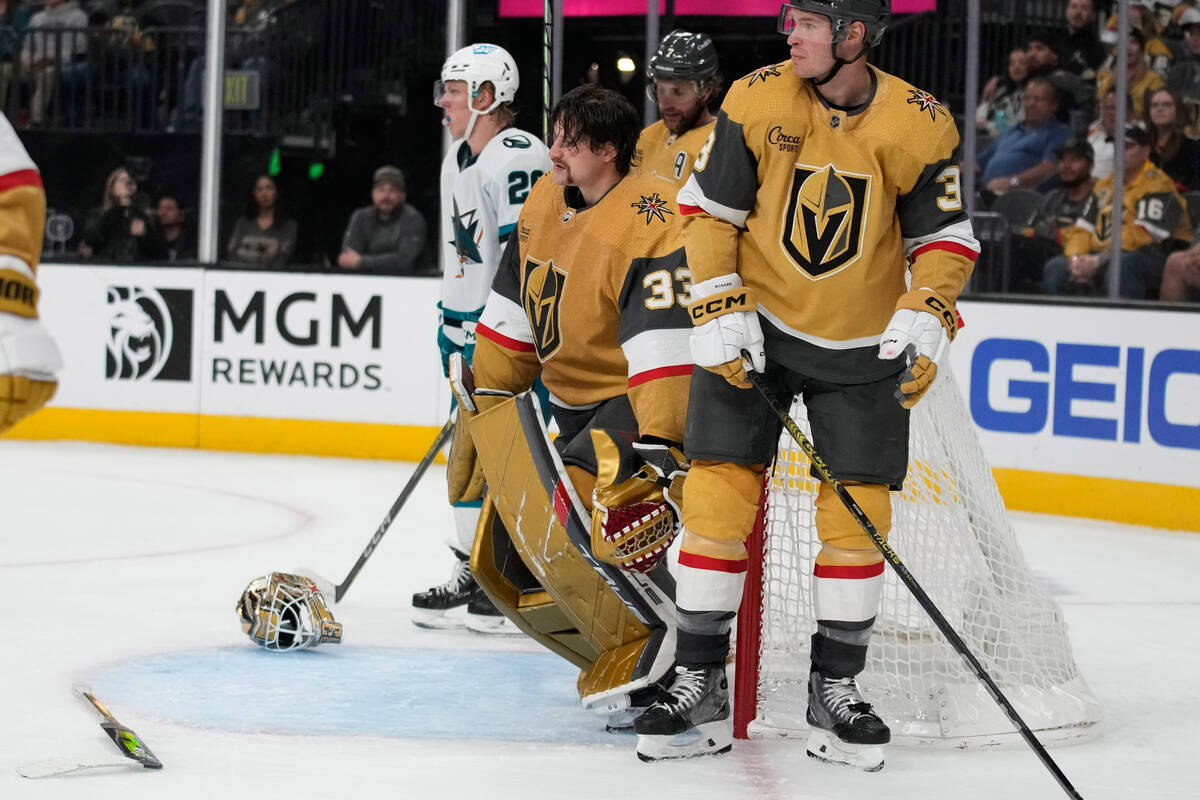 Vegas Golden Knights goaltender Adin Hill (33) loses his helmet during the third period of an N ...